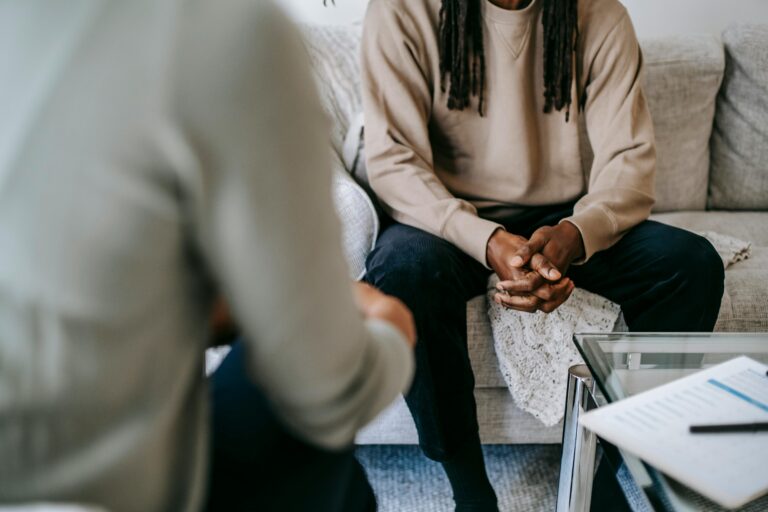 Man speaking with psychologist