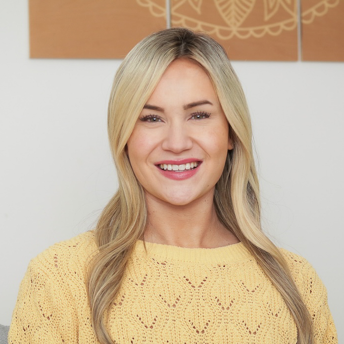 A headshot of Laura Newcomb, LMHC at Beacon Therapy Group.